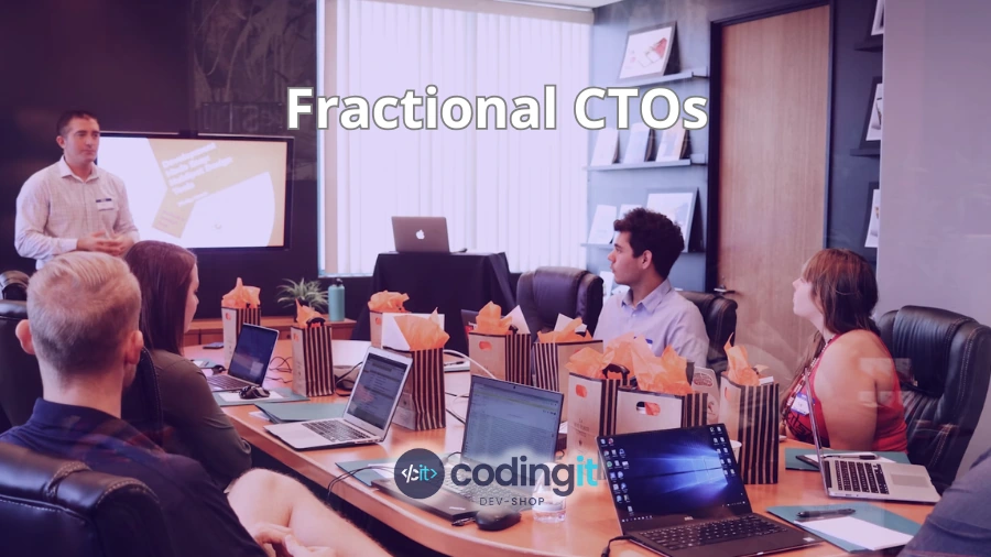 Group of professionals in a meeting led by a Fractional CTO, with a text that reads "Fractional CTOs" and CodingIT's logo displayed