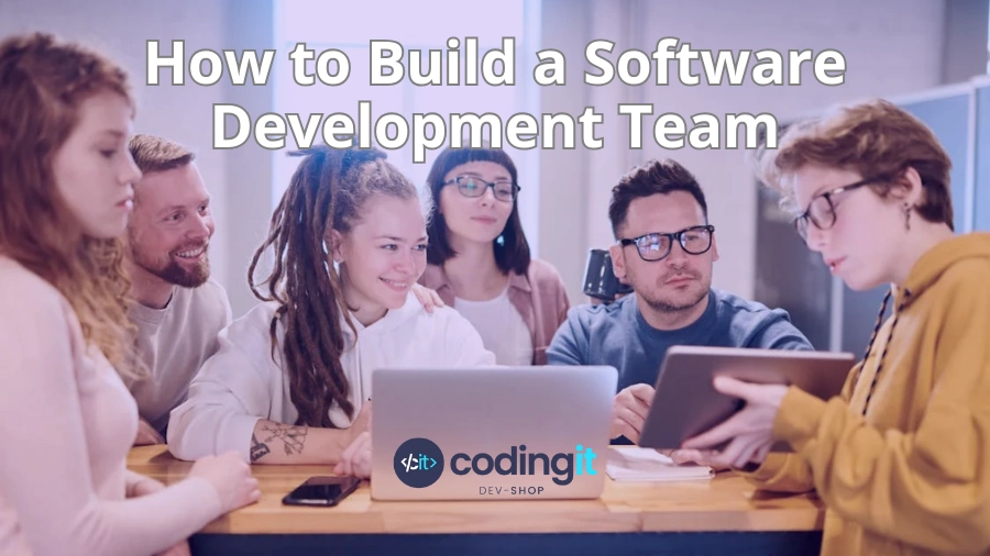 A software development team collaborating around a table. The image includes CodingIT’s logo and the title "How to Build a Software Development Team"